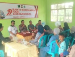 HUT Bhayangkara Ke 79 Jajaran Polres Mesuji melalui Kasie Dokkes mengadakan acara Bhakti Kesehatan di Desa Harapan Jaya